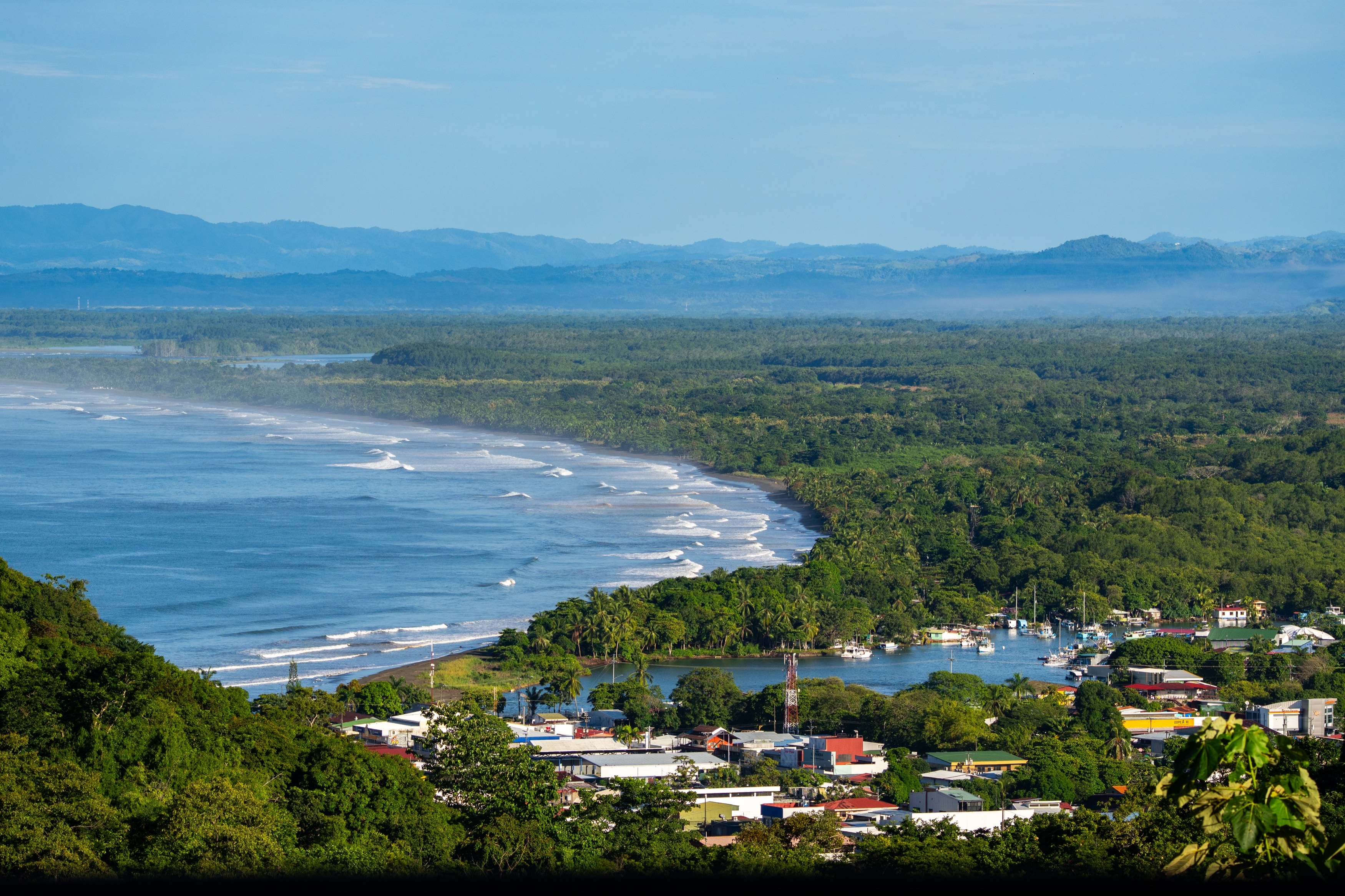 The view from the property — the coastline, the beach break and Marina Pez Vela below