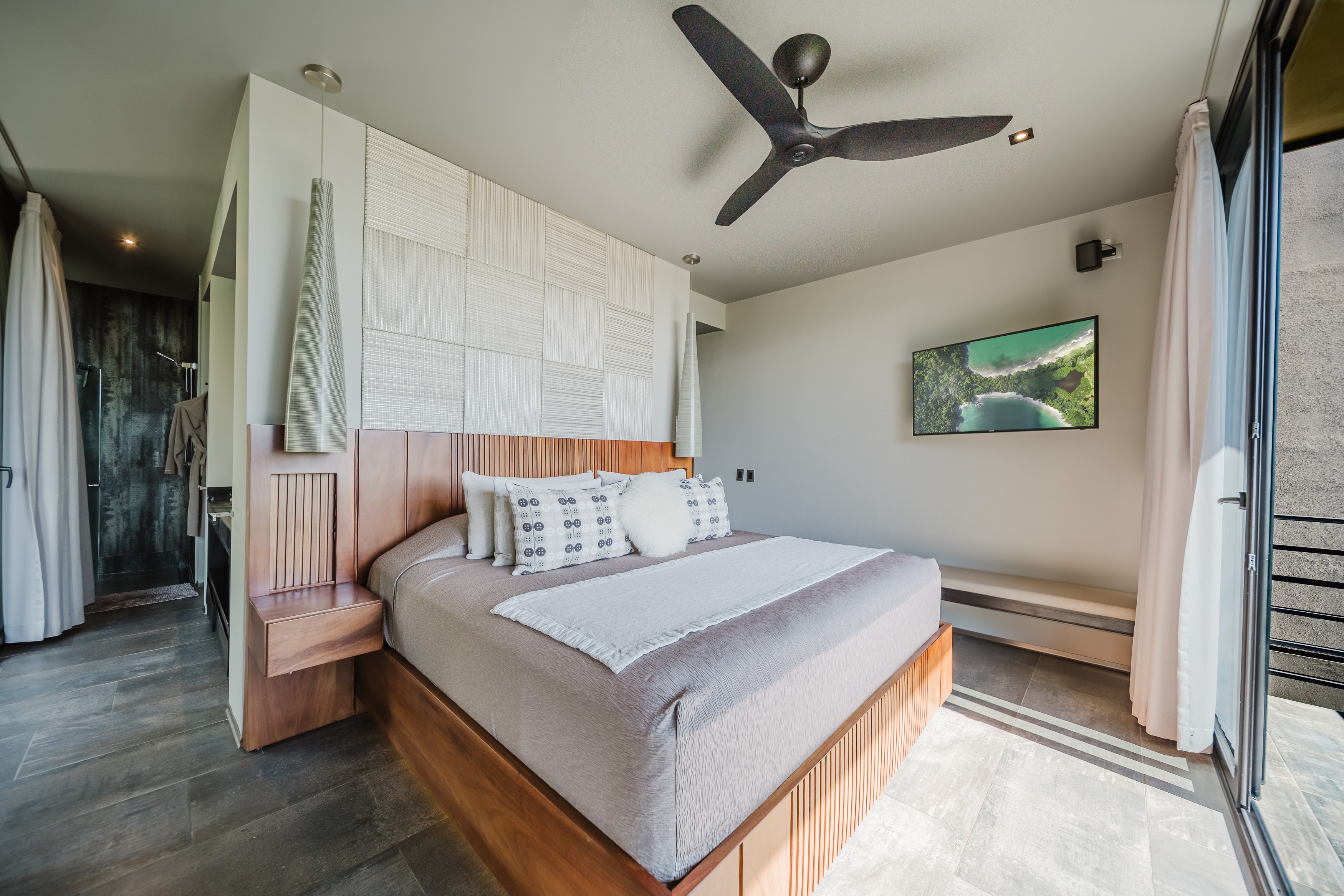 Suite — warm wood headboard